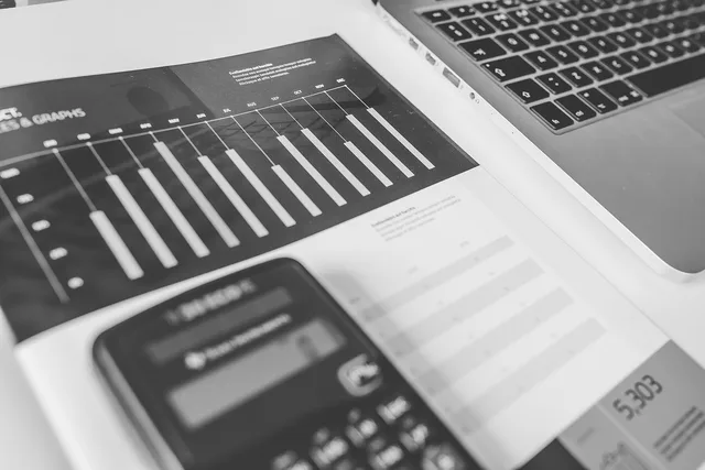 calculator, numbers, accounting, charts, graphs, finance, macbook, laptop, computer, technology, gray computer, gray technology, gray laptop, gray finance, gray numbers, gray accounting, accounting, accounting, accounting, accounting, accounting, finance. Newsletter ROI needs a causal comparison before it needs a formula
